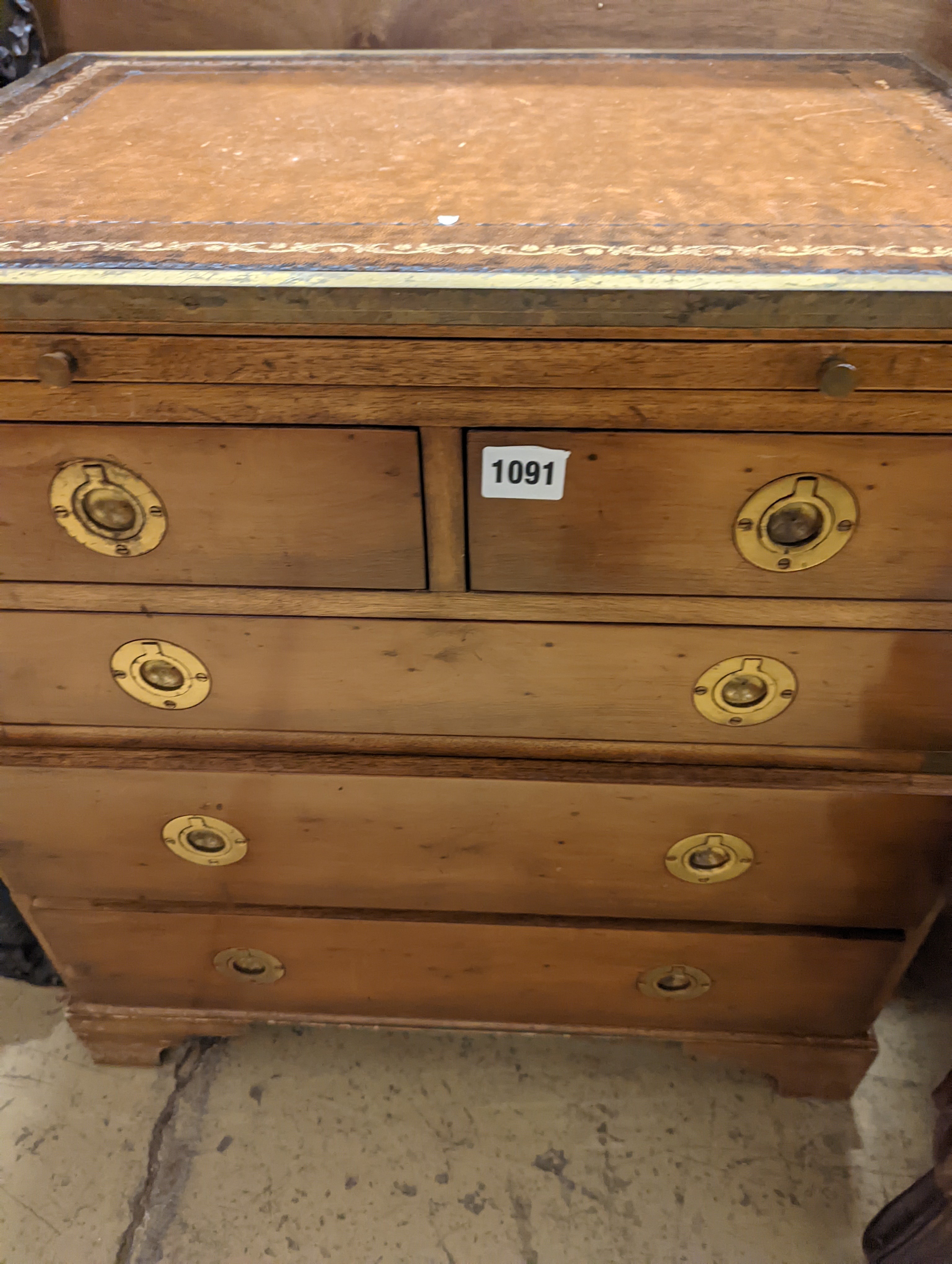 A pair of reproduction brass mounted military style yew veneered bedside chests with leather inset tops, width 56cm, depth 40cm, height 60cm